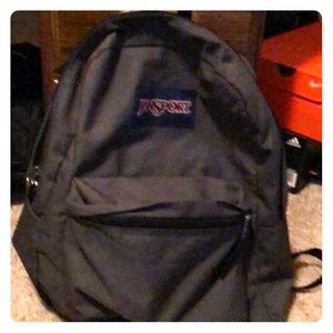 A gray Jan sport backpack